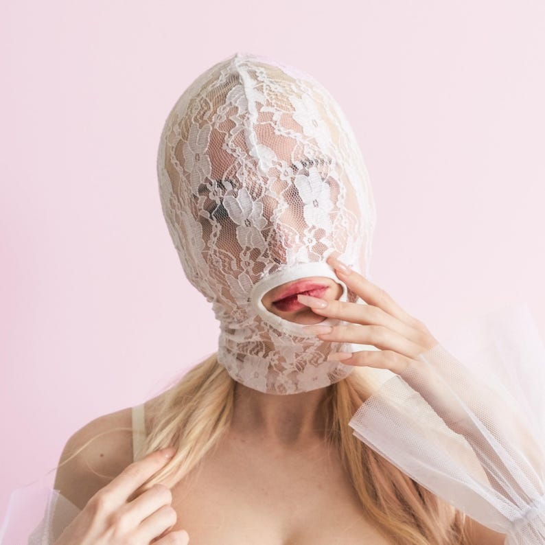 Handmade white full-face mask with only the mouth showing 70