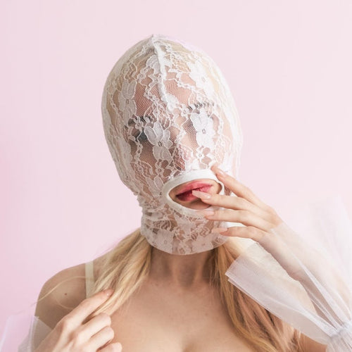 Handmade white full-face mask with only the mouth showing 70