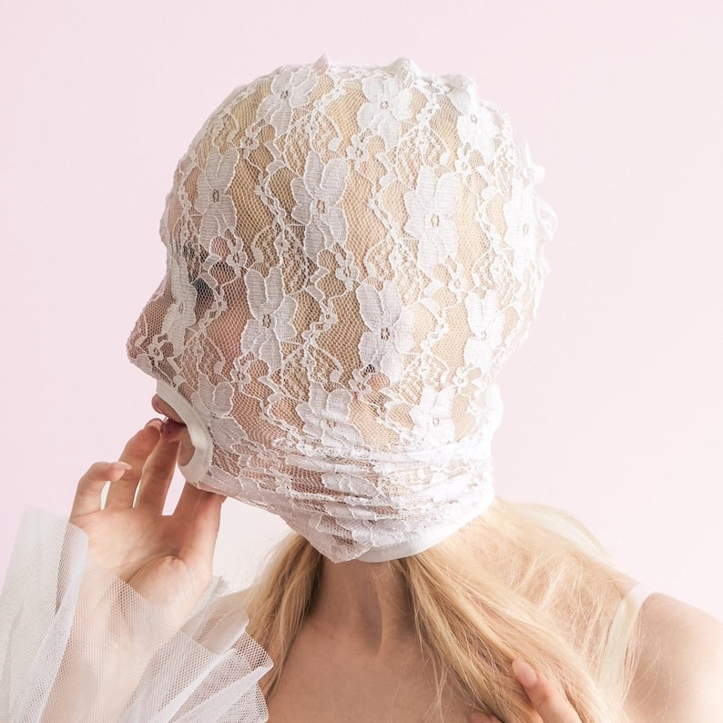 Handmade white full-face mask with only the mouth showing 70