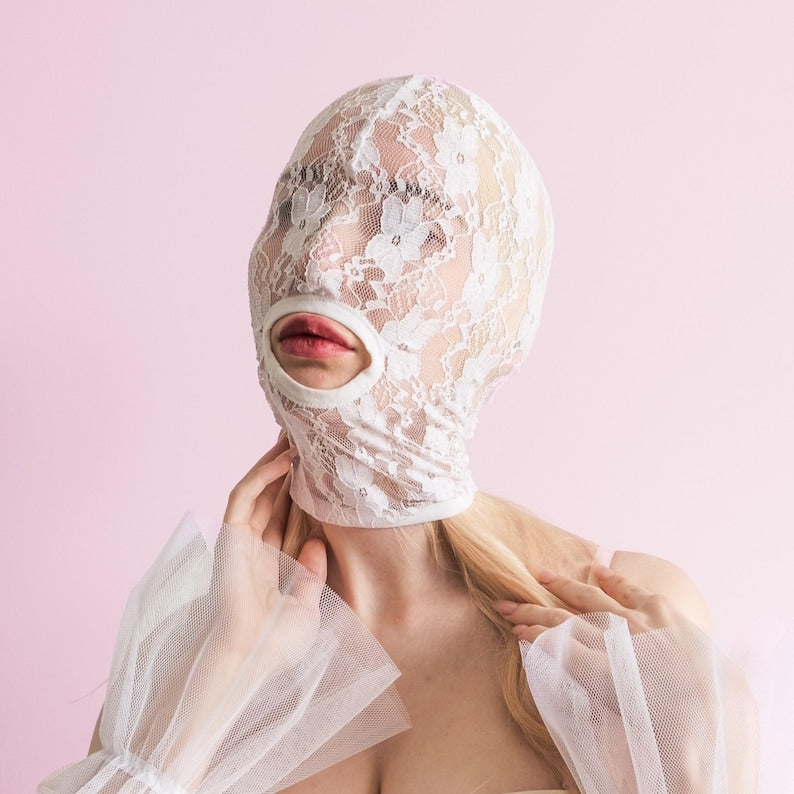 Handmade white full-face mask with only the mouth showing 70