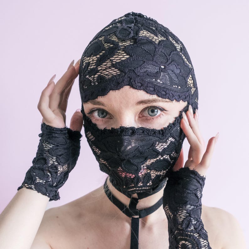 A handmade black mask that only reveals the eyes.74