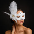 Handcrafted luxury feather and rhinestone mask