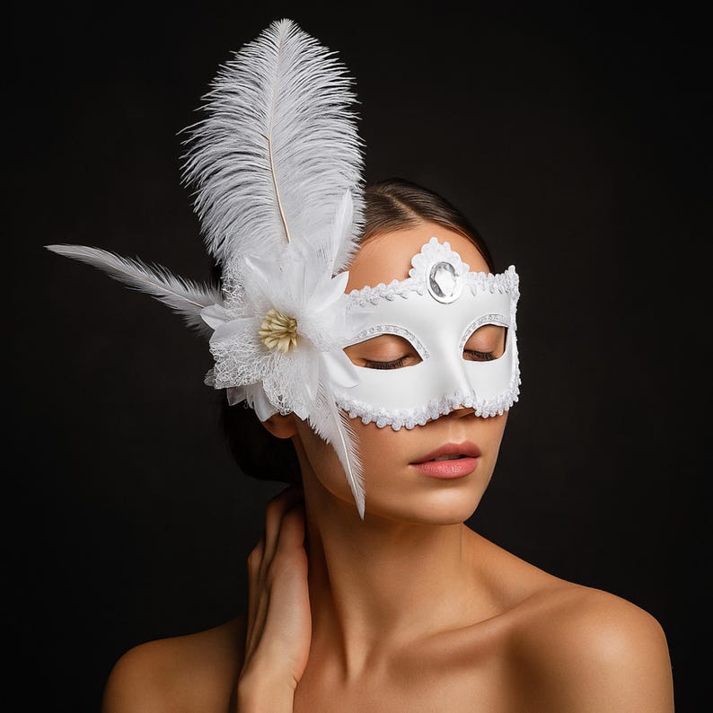 Handcrafted luxury feather and rhinestone mask