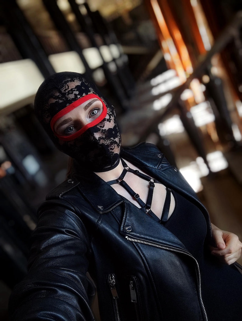 Handmade black and red lace mask, only revealing the eyes.78